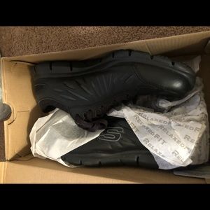 Black sketcher work shoe